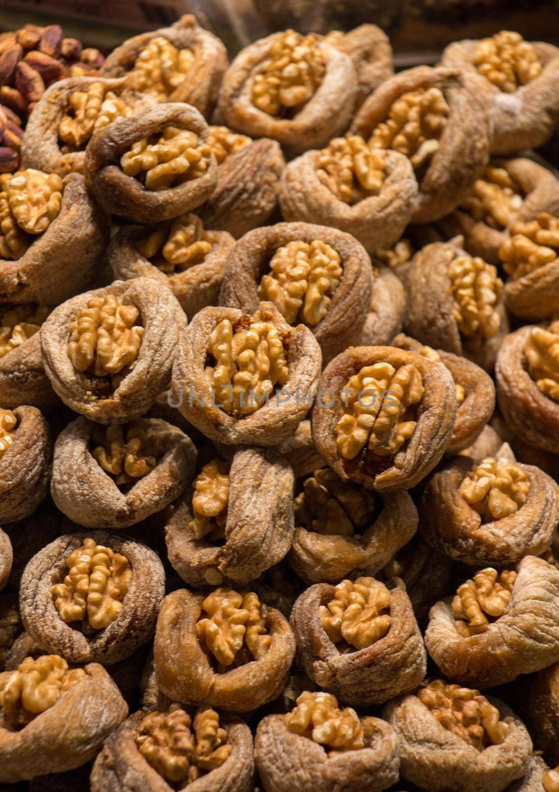 Pile of whole walnuts  without nutshells in fig by berkay