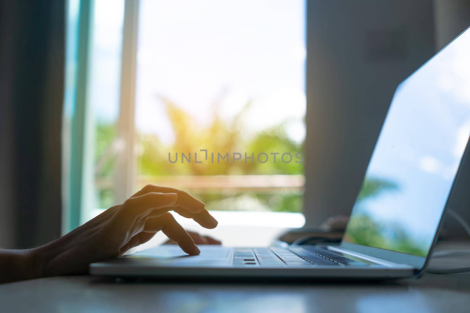 People using laptop to work study on work desk. Business, financial, trade stock maket and social network. by Suwant