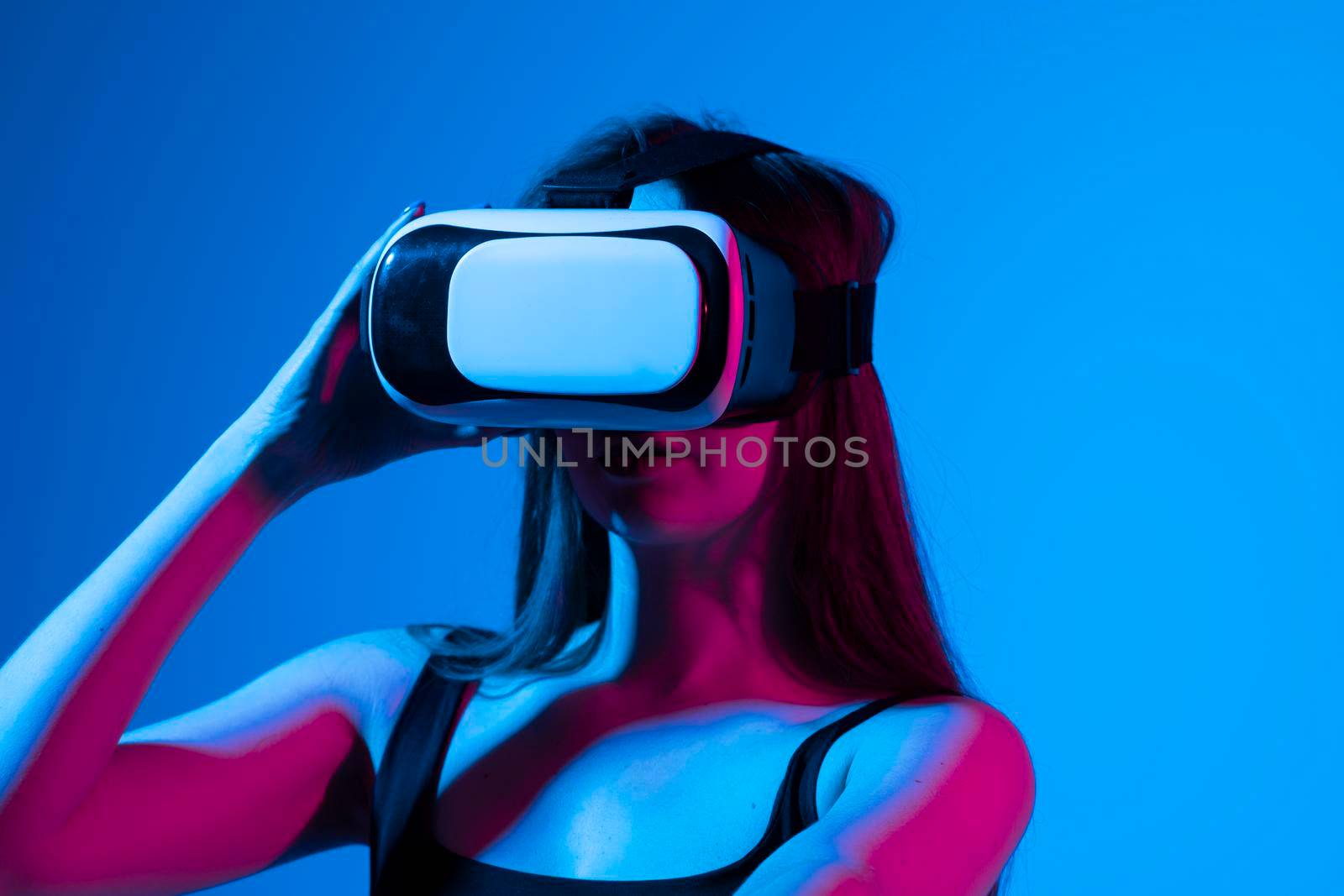 Woman with glasses of virtual reality. Future technology concept. by vovsht