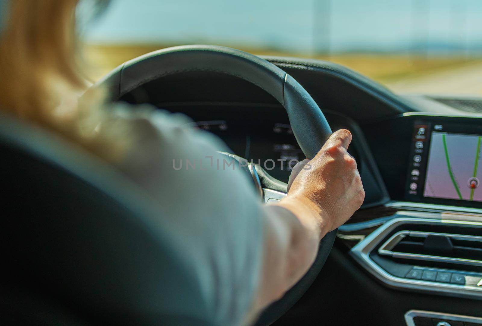 Woman Driver Behind the Wheel by welcomia