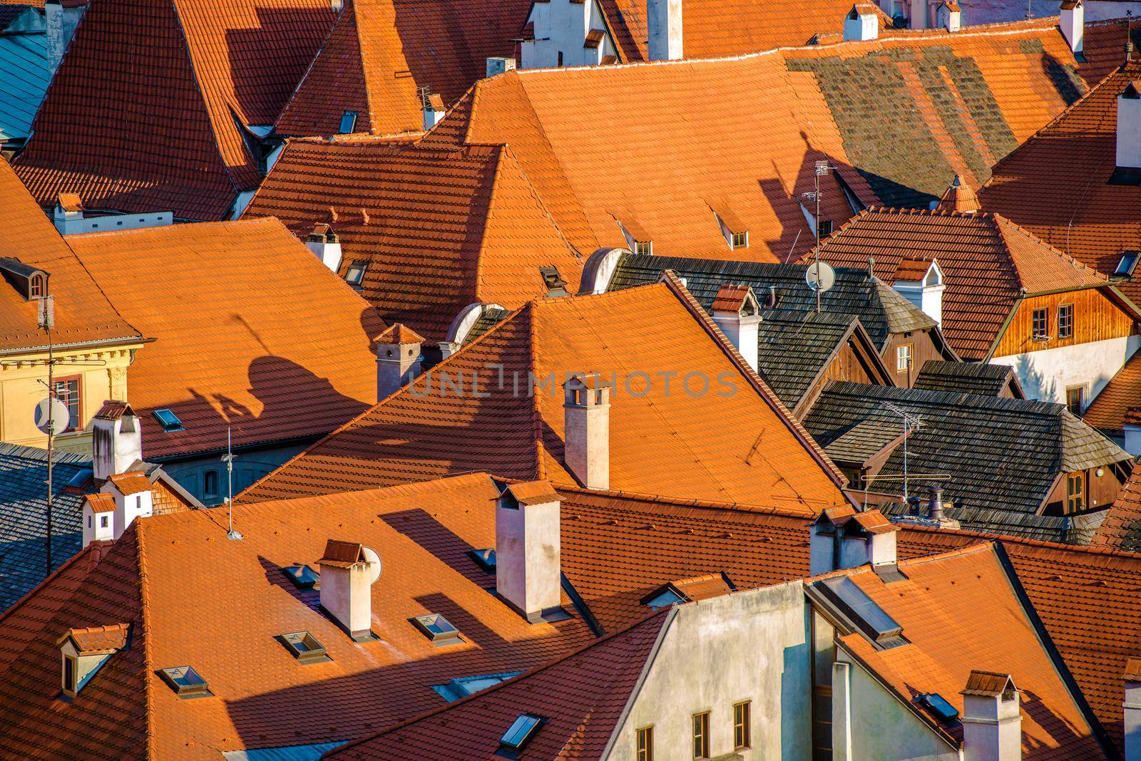 Aerial View Of Red And Brown Rooftops Of Old Buildings In Town.