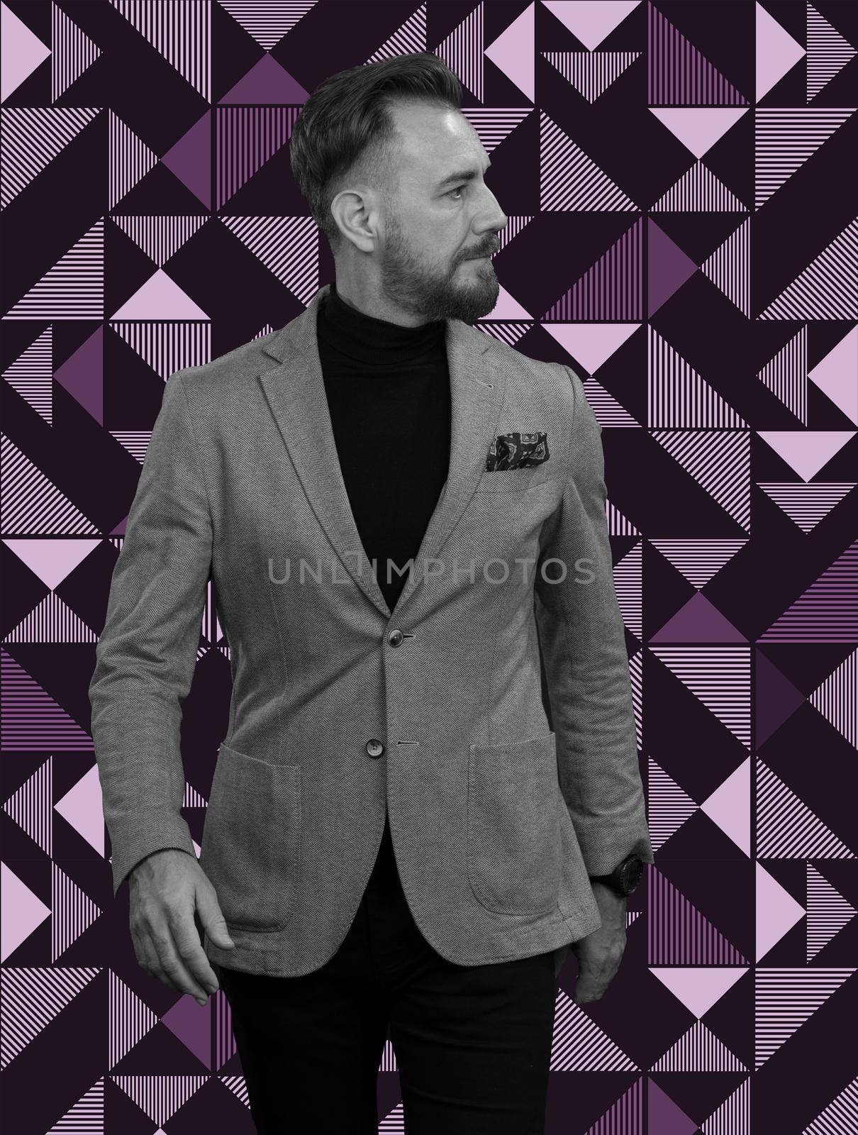 businessman walking forward wearing a causal suit, handsome senior business man hero shot portrait on colorful retro pattern background. by dotshock