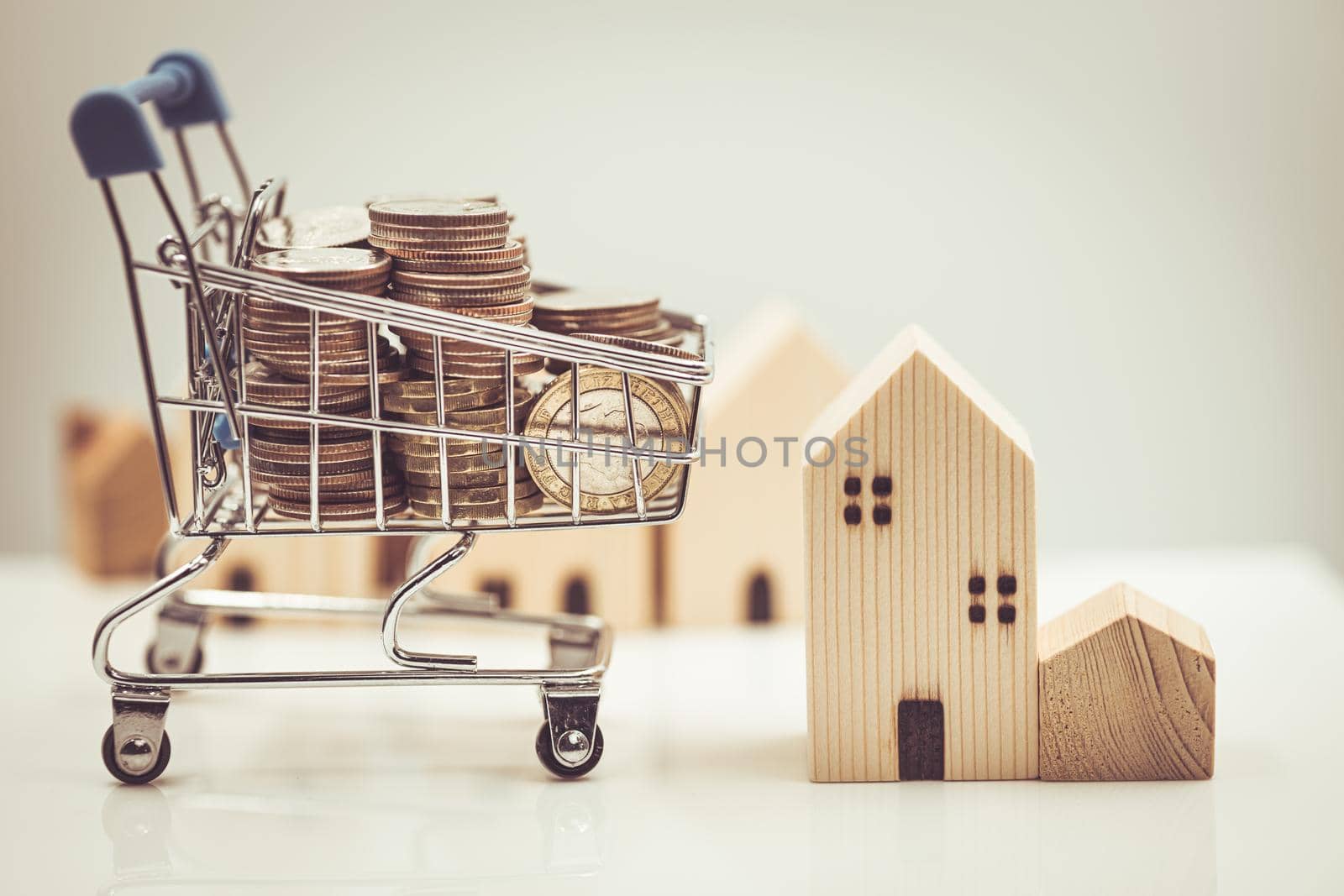 Buy a new home, shopping house sale with money cart trolley for mortgage and loan concept.