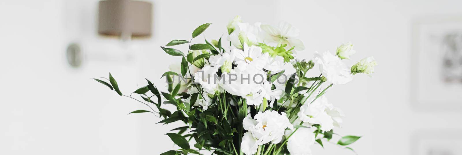 Bouquet of flowers in vase and home decor details, luxury interior design by Anneleven