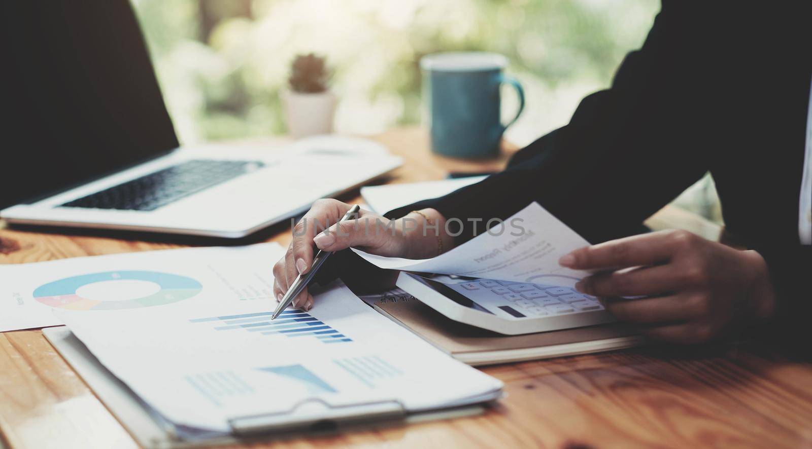 accountant woman working on desk business finance and accounting.