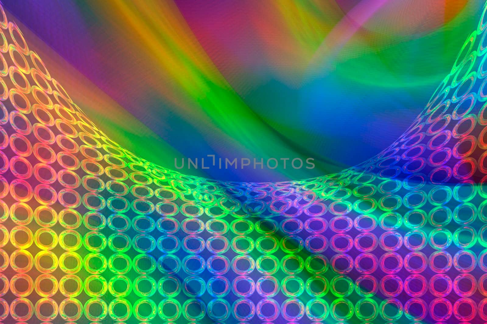 A beautiful rainbow background with an iridescent grid of rings.