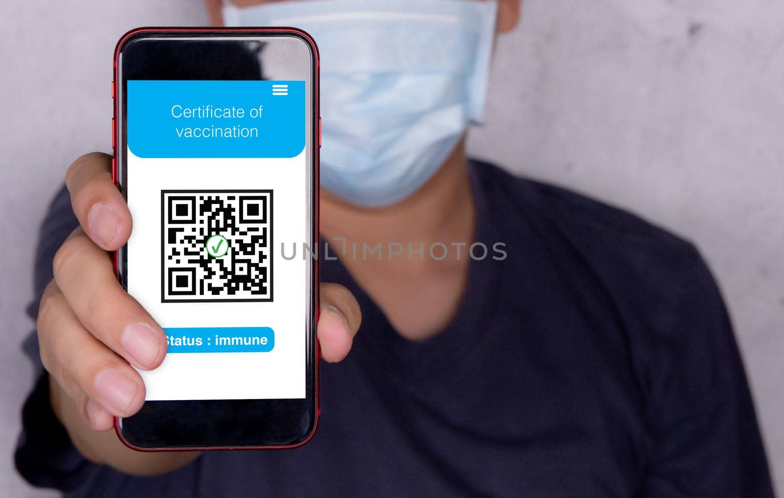 Certificate of vaccination Covid-19, man holding smartphone showing vaccinated, prevention epidemic, health and antibody, one person, male in face mask hold mobile smart phone show identity.
