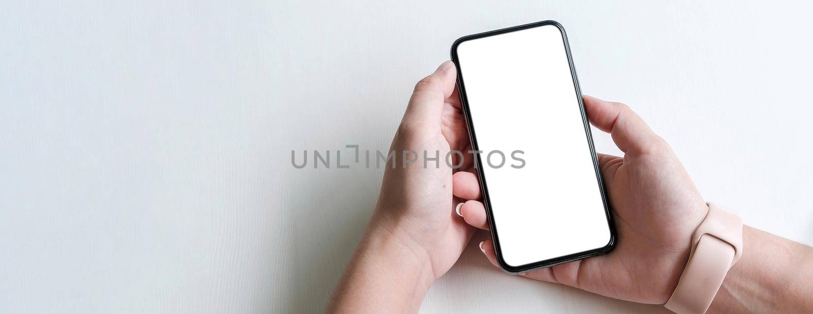 woman using Smartphone. Blank screen mobile phone for graphic display montage.networking service.