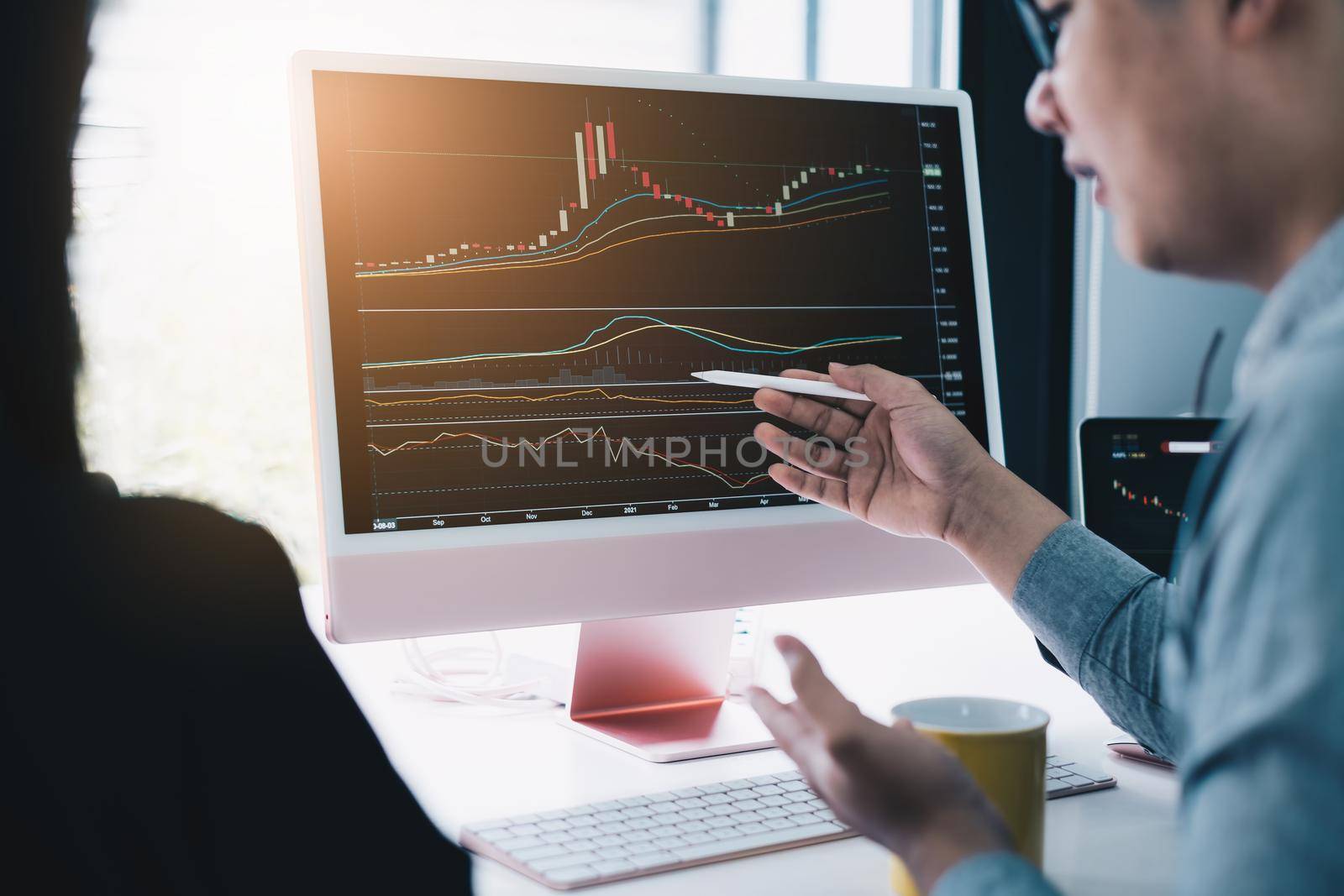 Business team working together analyze technical price graph and indicator. Chart and stock trading computer screen. by itchaznong