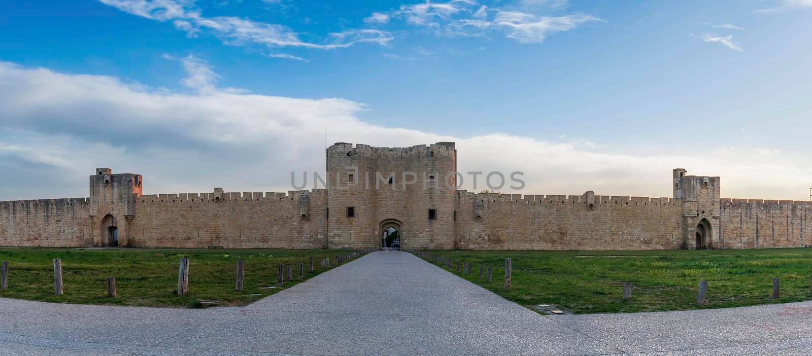 Gate and east ramparts, Aigues-Mortes in the early morning, in the Gard in Occitanie, France by Frederic