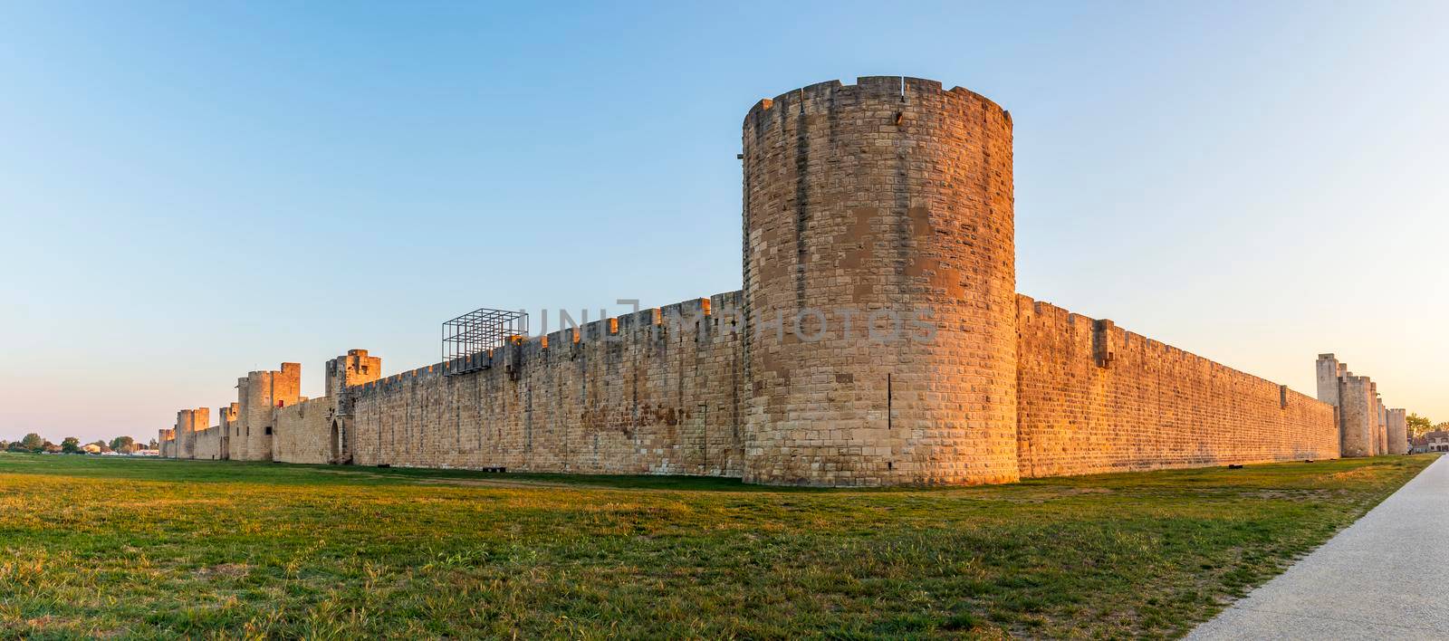 Gate and east ramparts, Aigues-Mortes in the early morning, in the Gard in Occitanie, France by Frederic