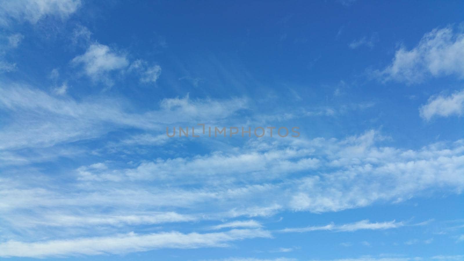 blue sky with white clouds by zakob337