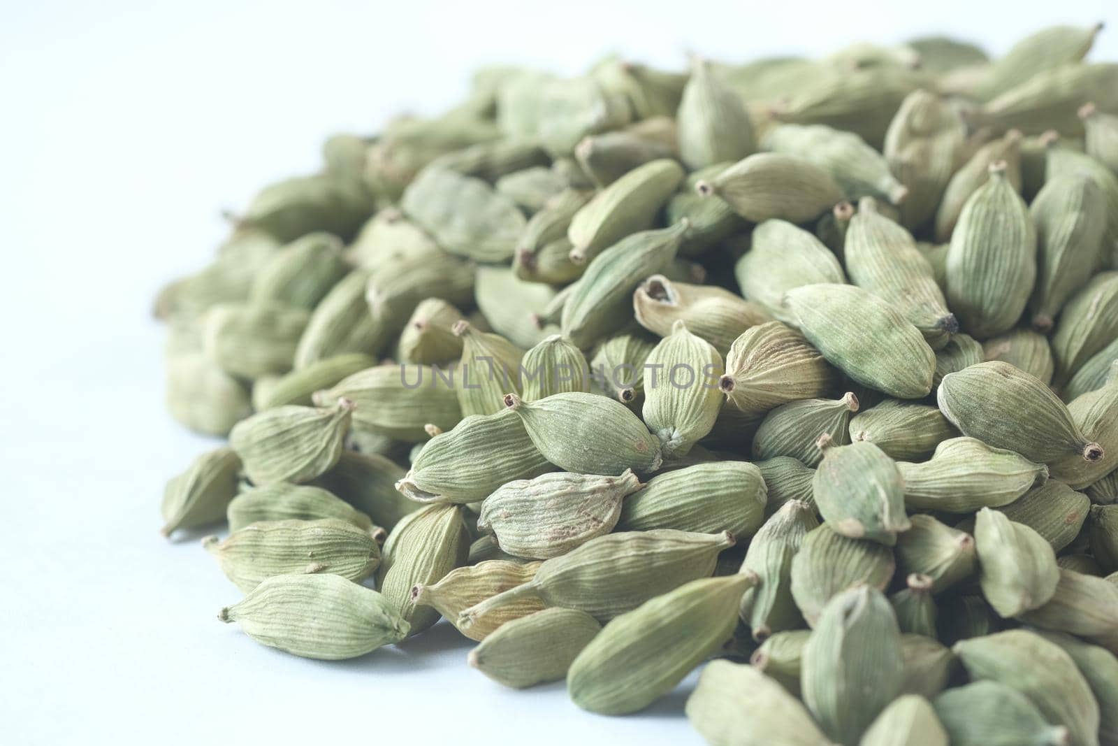 close up of Cardamom on white background .