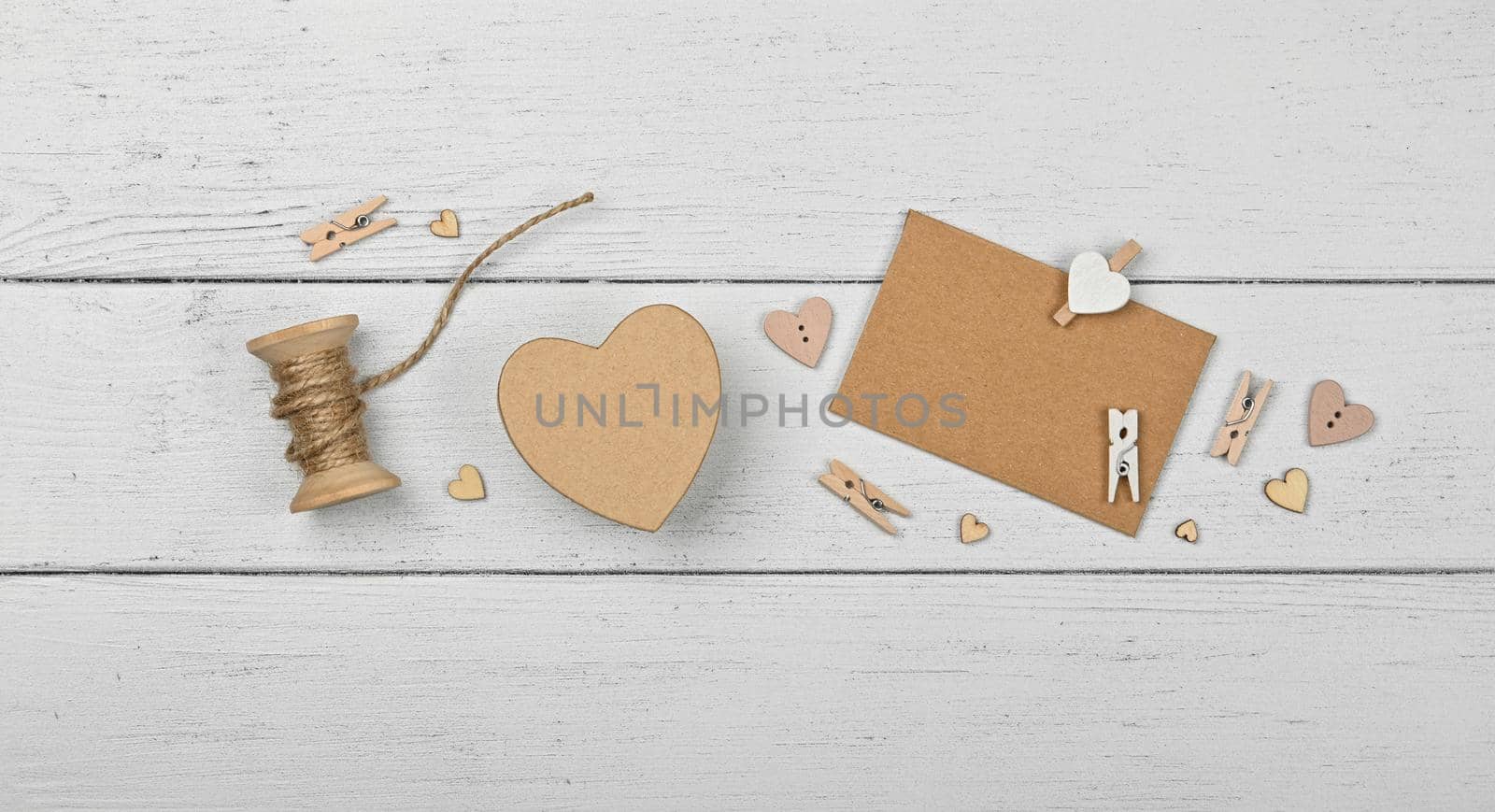 Preparing Valentine gifts on white table by BreakingTheWalls