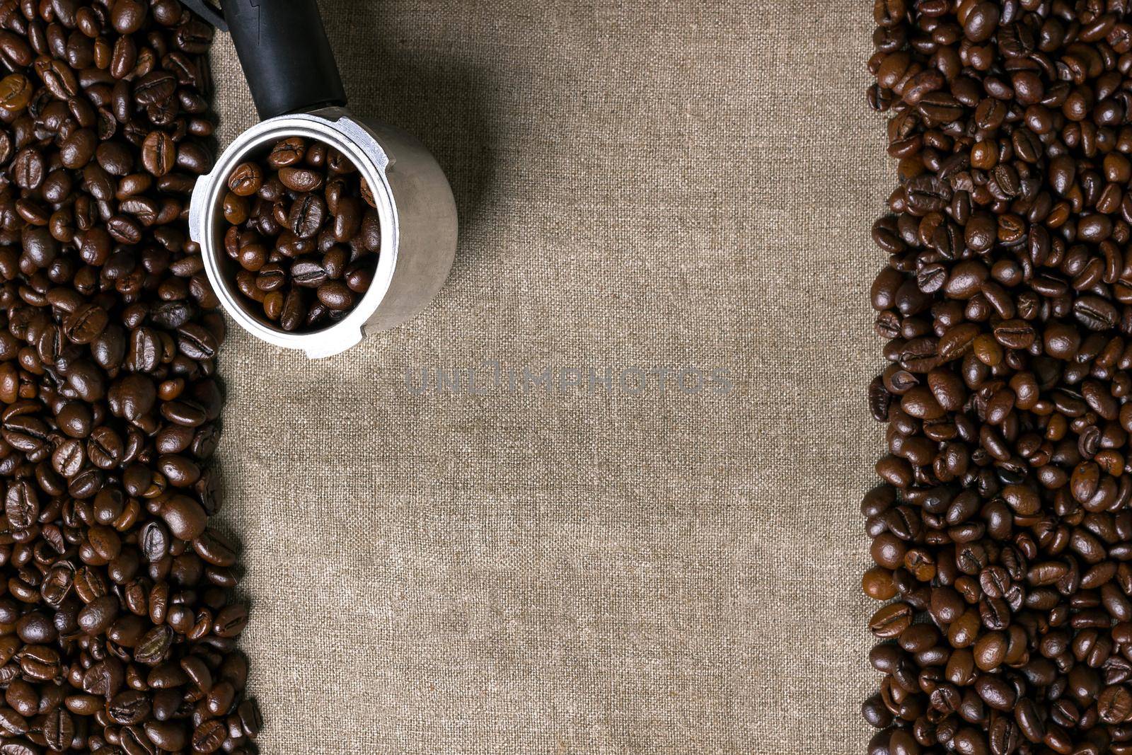 Coffee beans on burlap background. Top view. Copy space. Still life. Mock-up. Flat lay