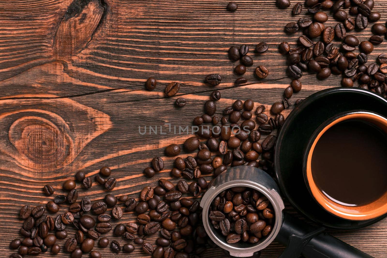 Coffee cup and beans frame on wooden table by nazarovsergey