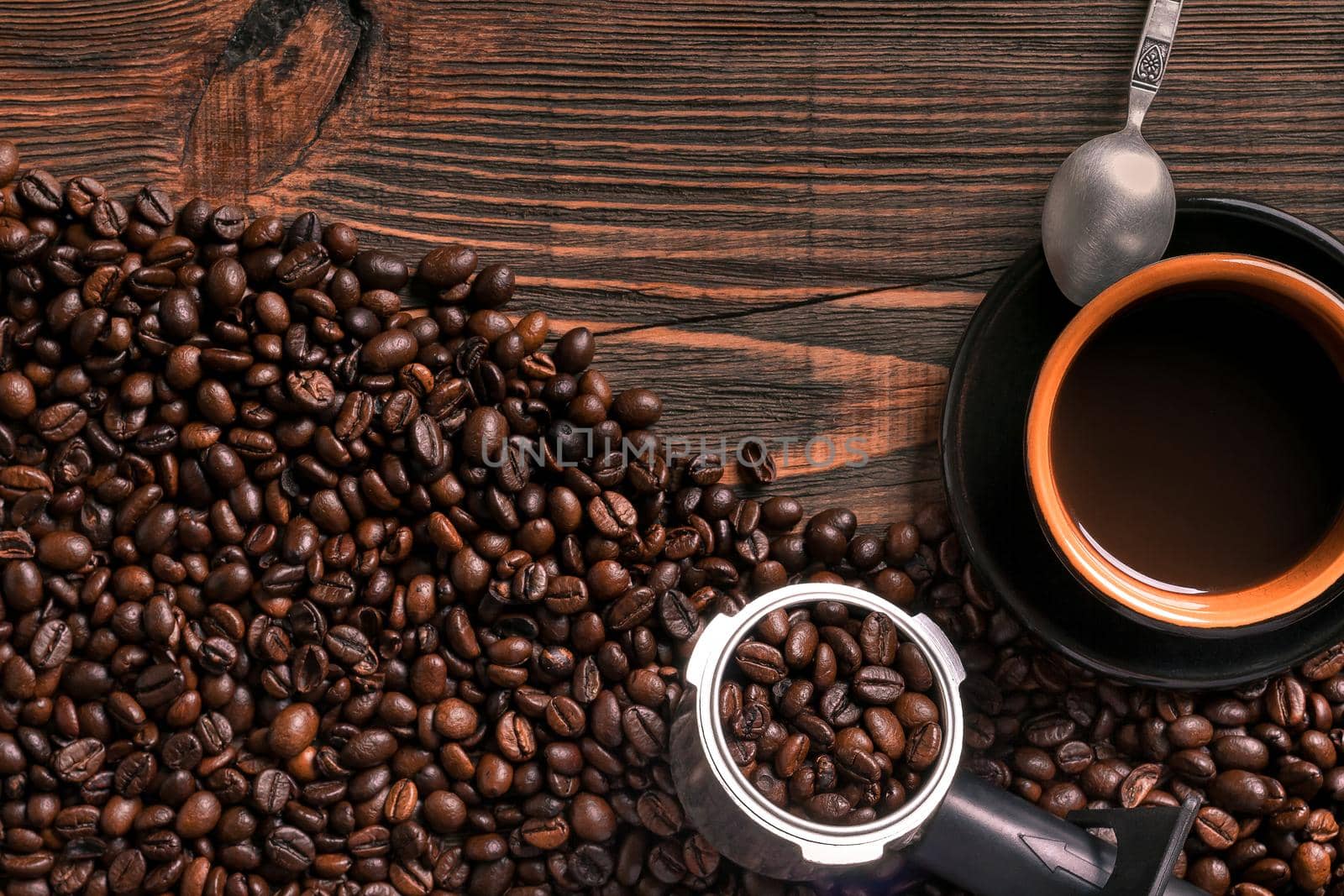 Coffee cup and beans frame on wooden table by nazarovsergey