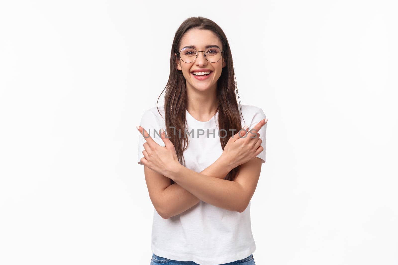Waist-up portrait of enthusiastic smiling young brunette woman in glasses and casual t-shirt give advice where find all you need, laughing friendly looking camera, pointing left and right.