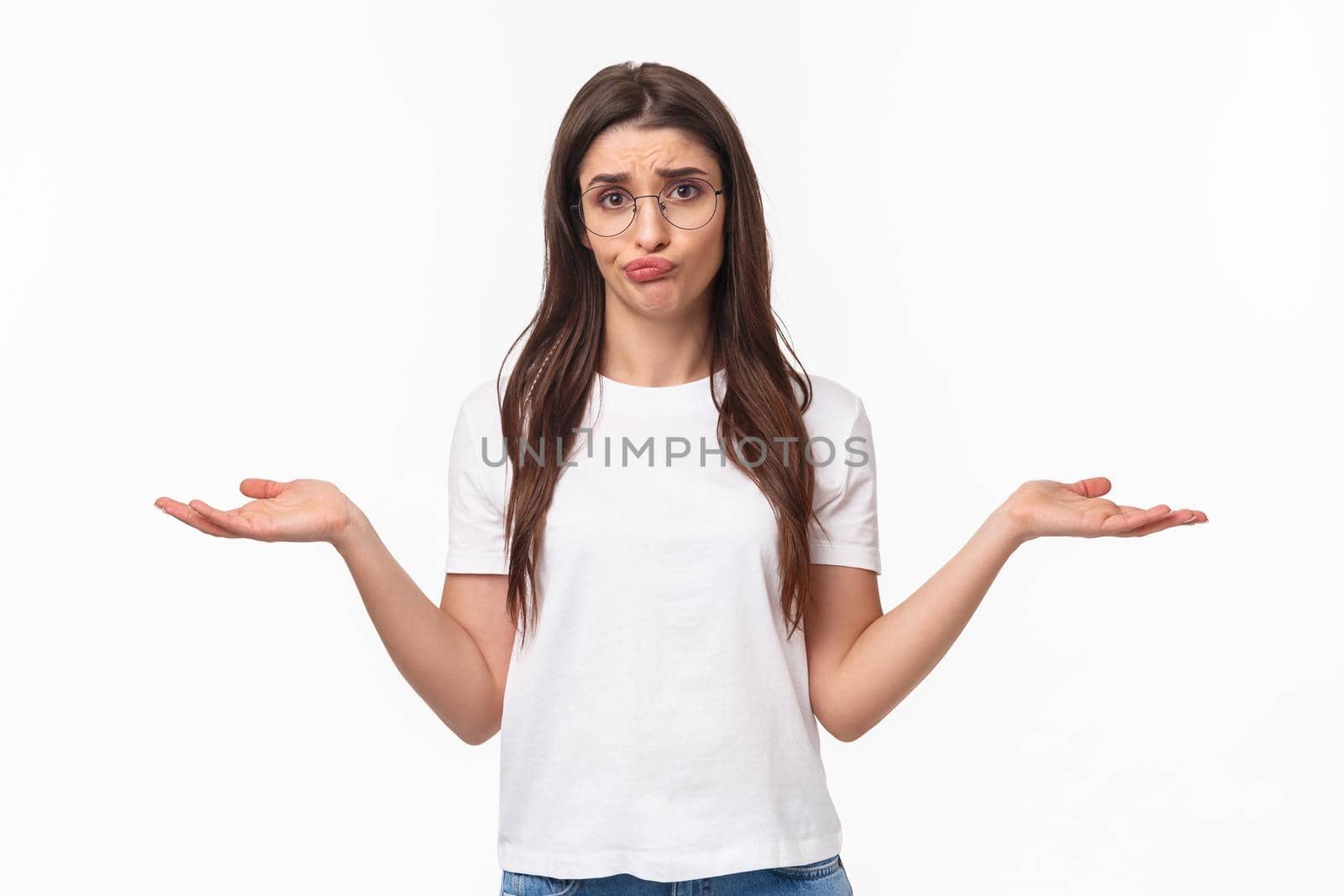 Waist-up portrait of pretty girl shrugging and smirk indecisive, troubled to answer, dont know what to do, unaware how solve situation, standing confused and frustrated, white background by Benzoix