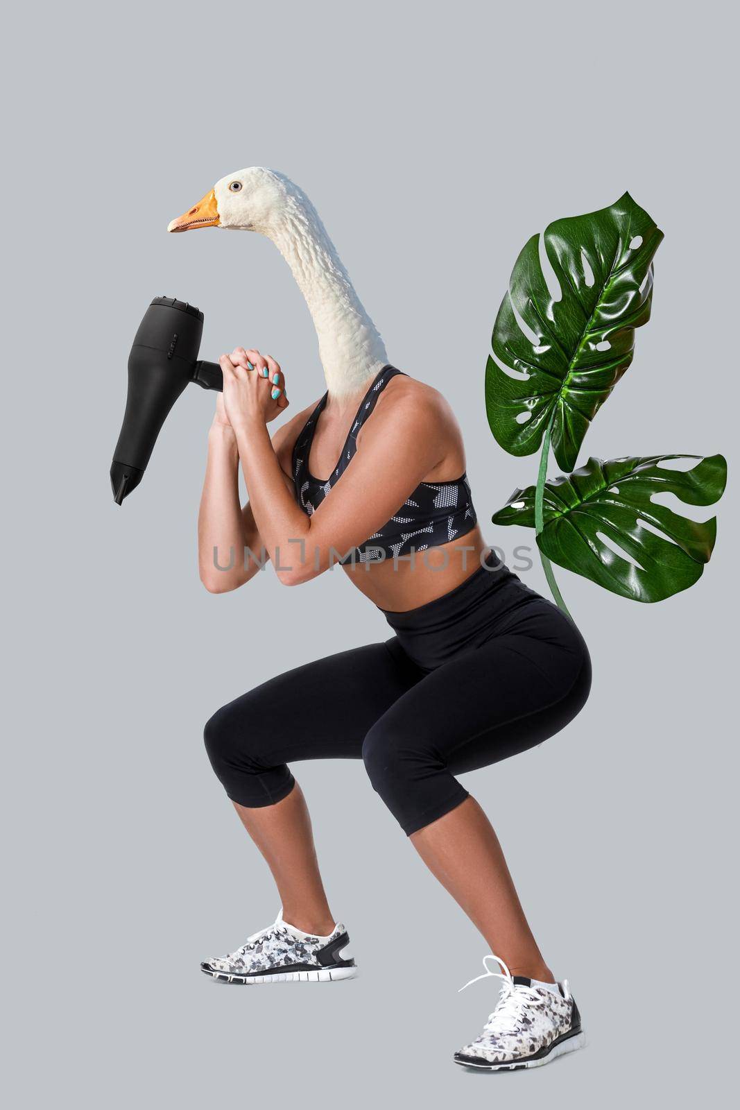 Beauty atletic woman in sport clothes with goose head. Sports concept on the theme of comics and сontemporary art collage.