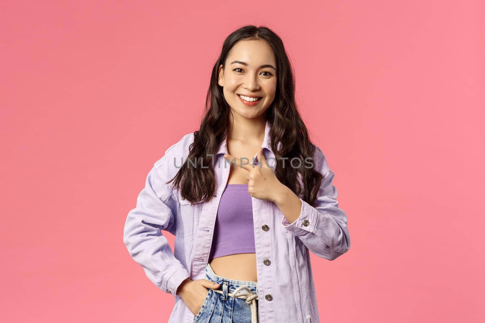 Portrait of charismatic pretty young woman in stylish streetstyle spring outfit, look camera, smiling and pointing left, inviting to event or check out product, advertisement concept by Benzoix