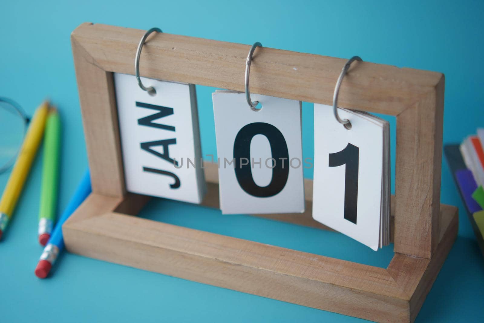 wooden calendar set on 1st of january ,