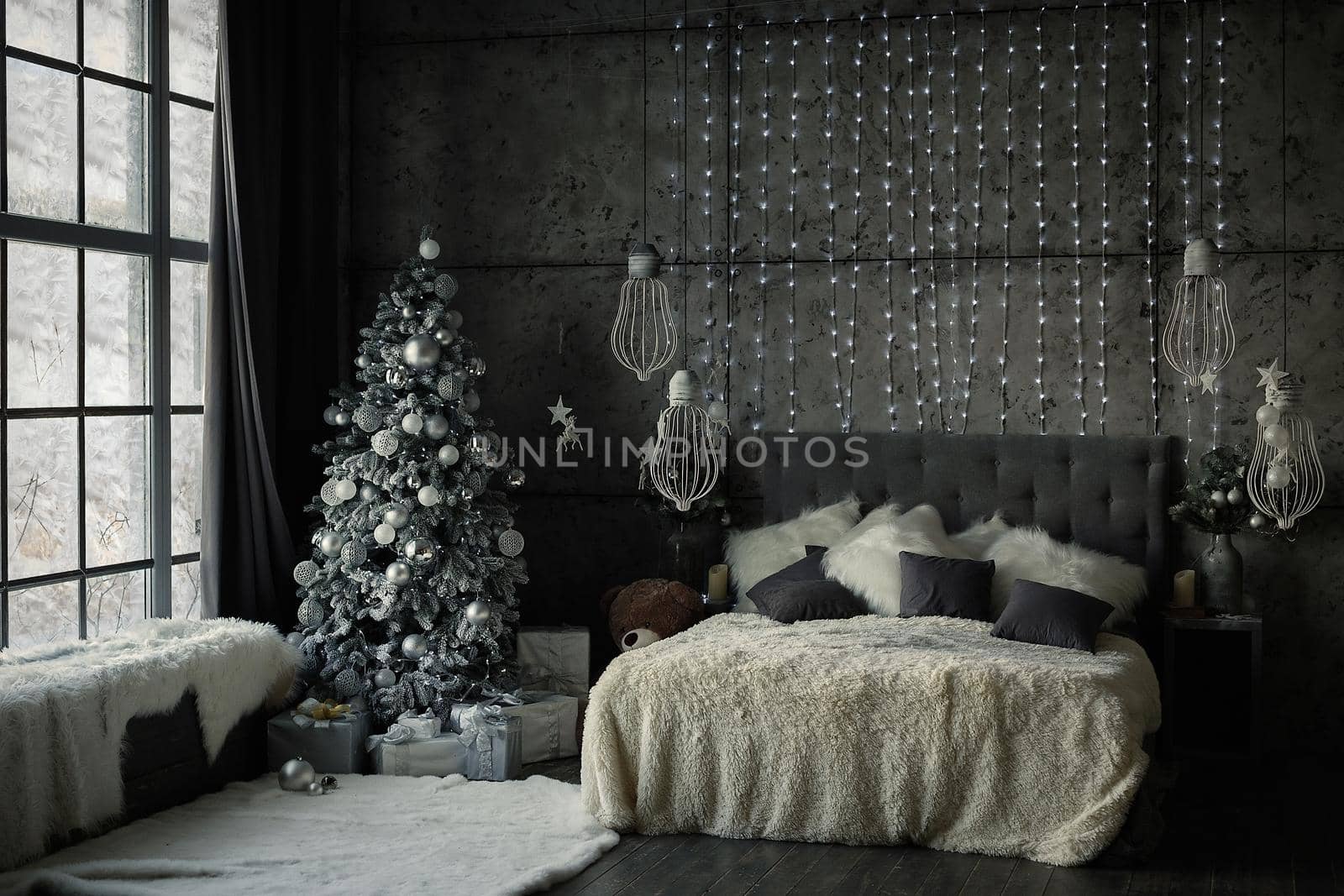 Christmas, New Year interior with gray wall background, decorated fir tree with garlands and balls, teddy bear and presents