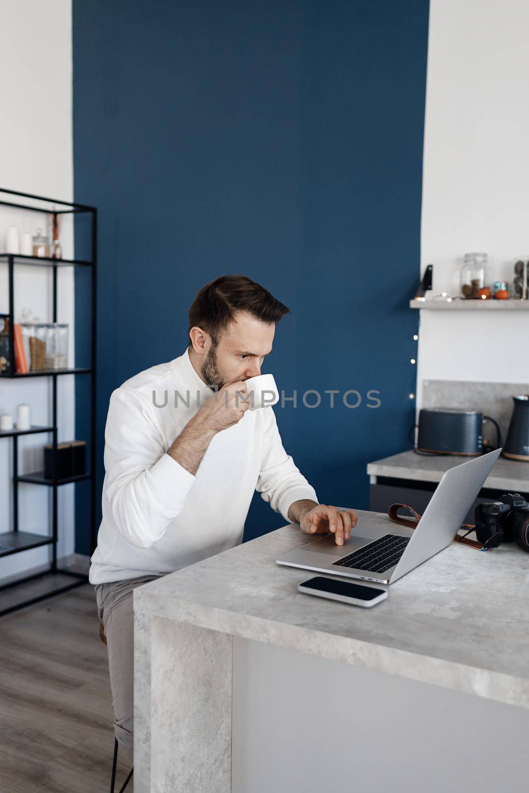 Handsome man indoor at home. High quality photo