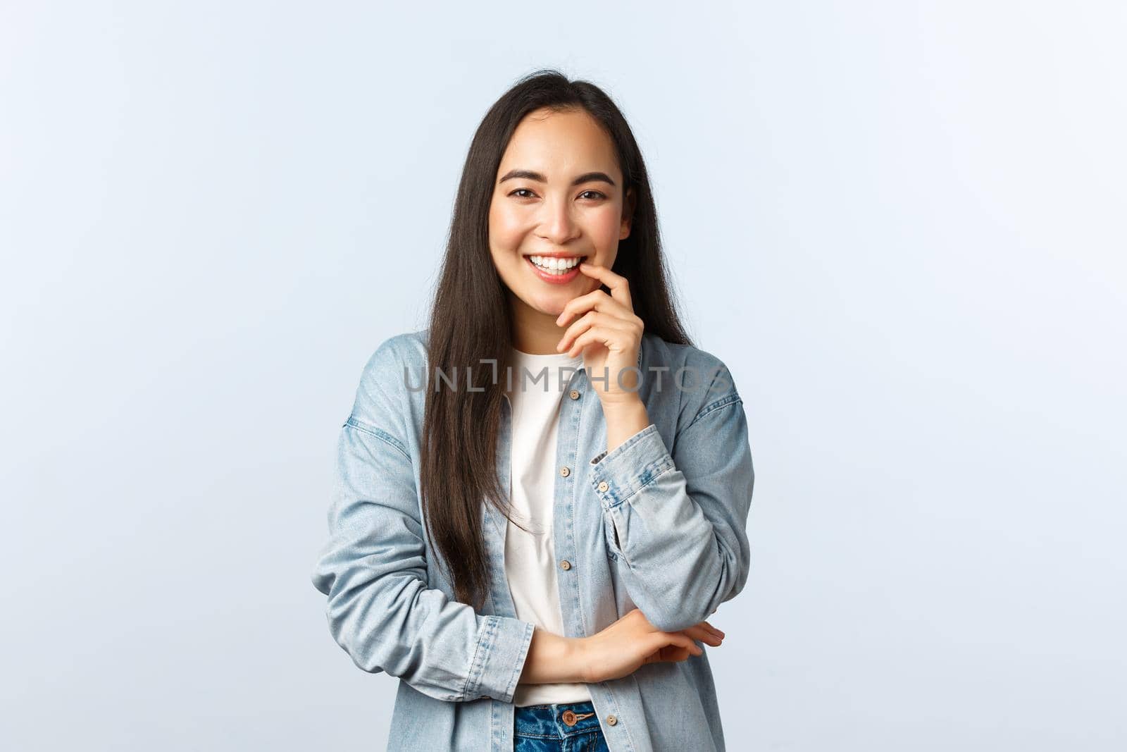 Lifestyle, people emotions and beauty concept. Enthusiastic attractive asian girl in casual clothes, laughing and smiling pleased, having conversation, lively talking to friends by Benzoix