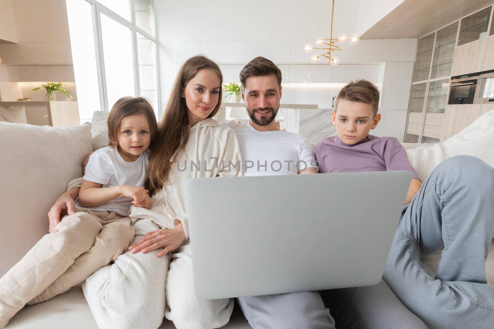 Family browsing internet in living room by ALotOfPeople