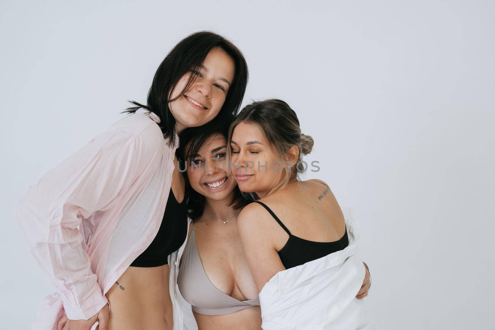 diverse models wearing comfortable underwear, enjoying time together, look at camera having smile and natural unique beauty