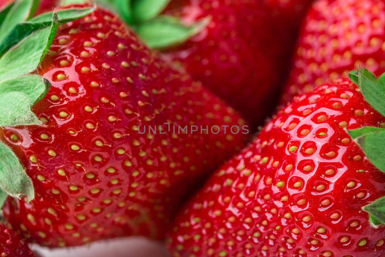 Fresh strawberry background. Ripe in close-up. by nazarovsergey