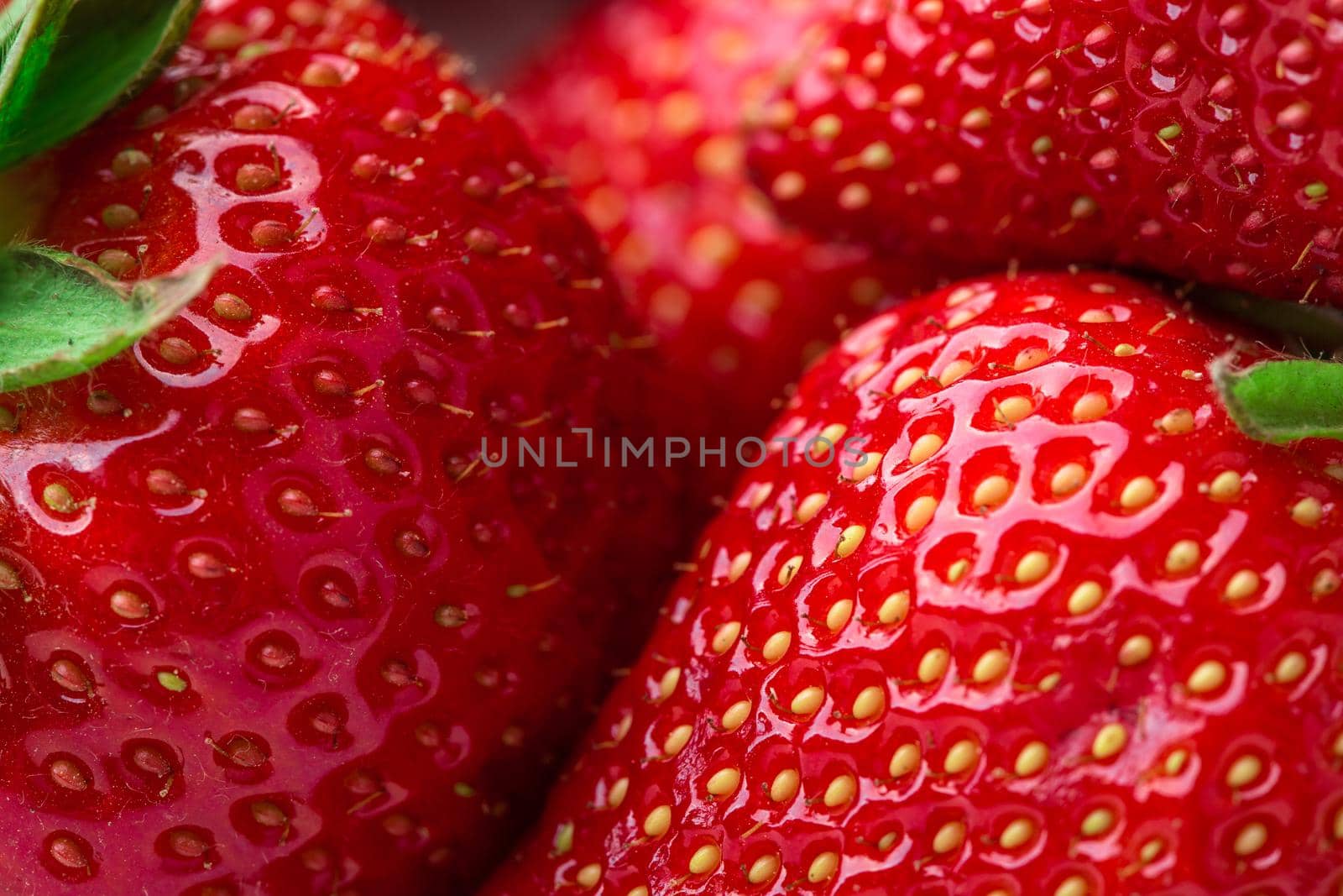 Fresh strawberry background. Ripe in close-up. by nazarovsergey