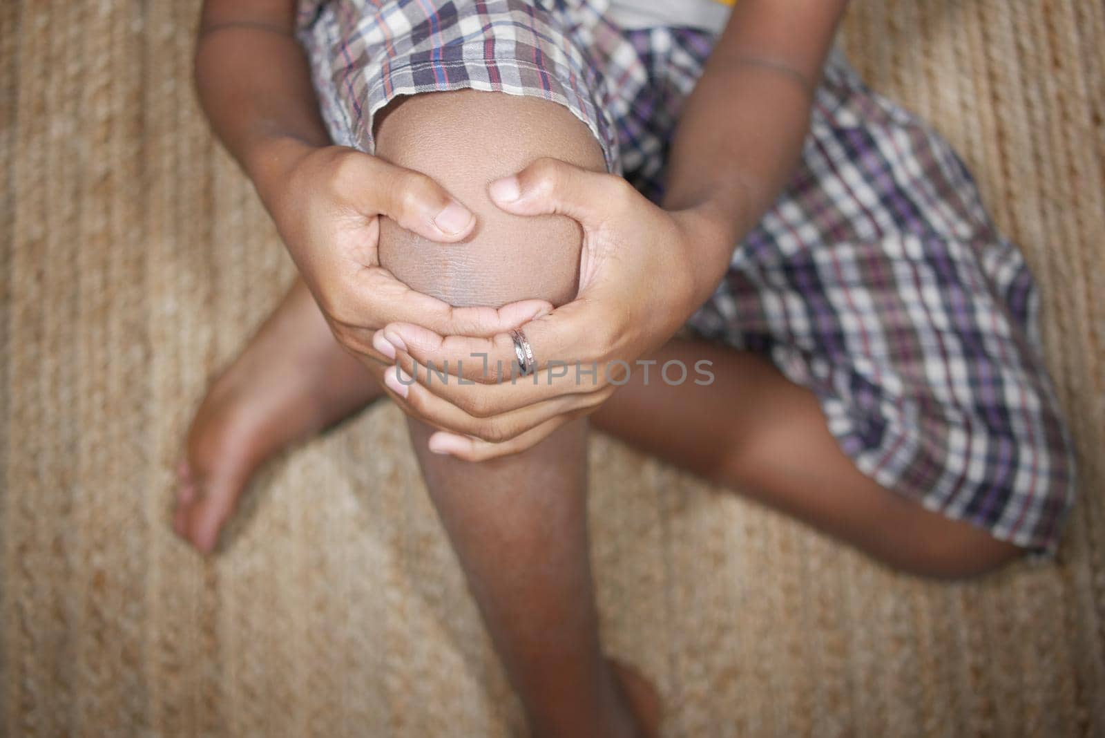 Close up on man suffering knee joint pain.