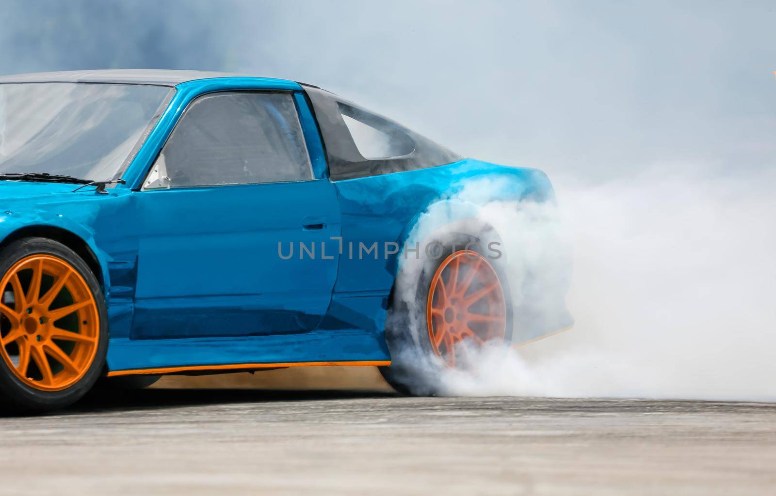 Race drift car burning tires on speed track by toa55