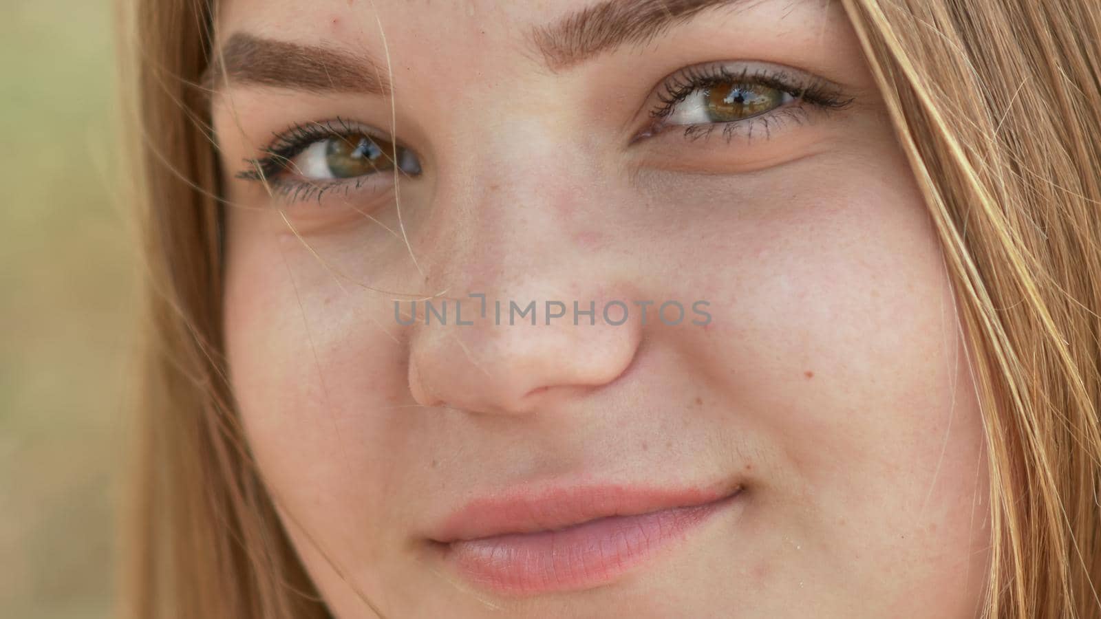 Close up of young smiling girl face. by DovidPro