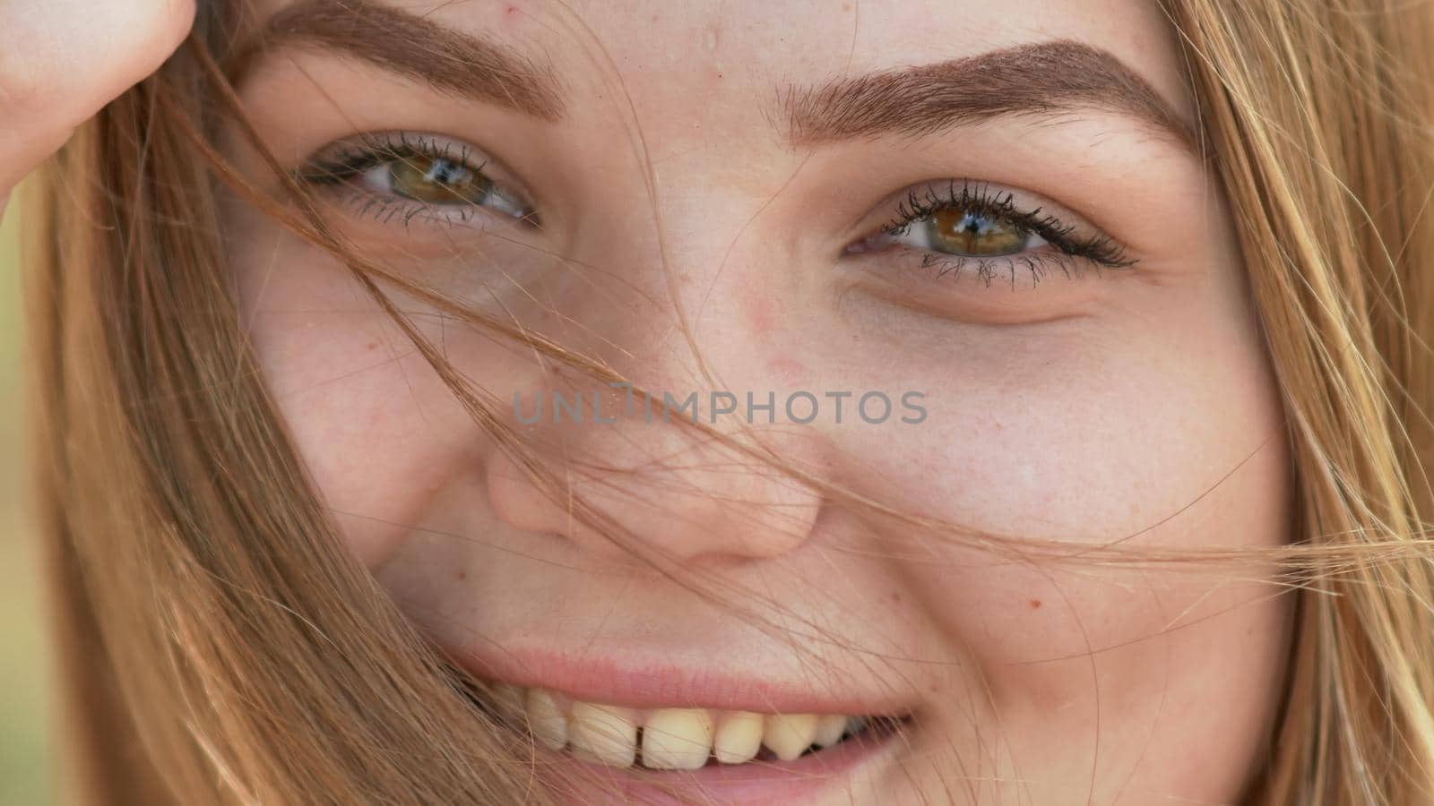 Close up of young smiling girl face
