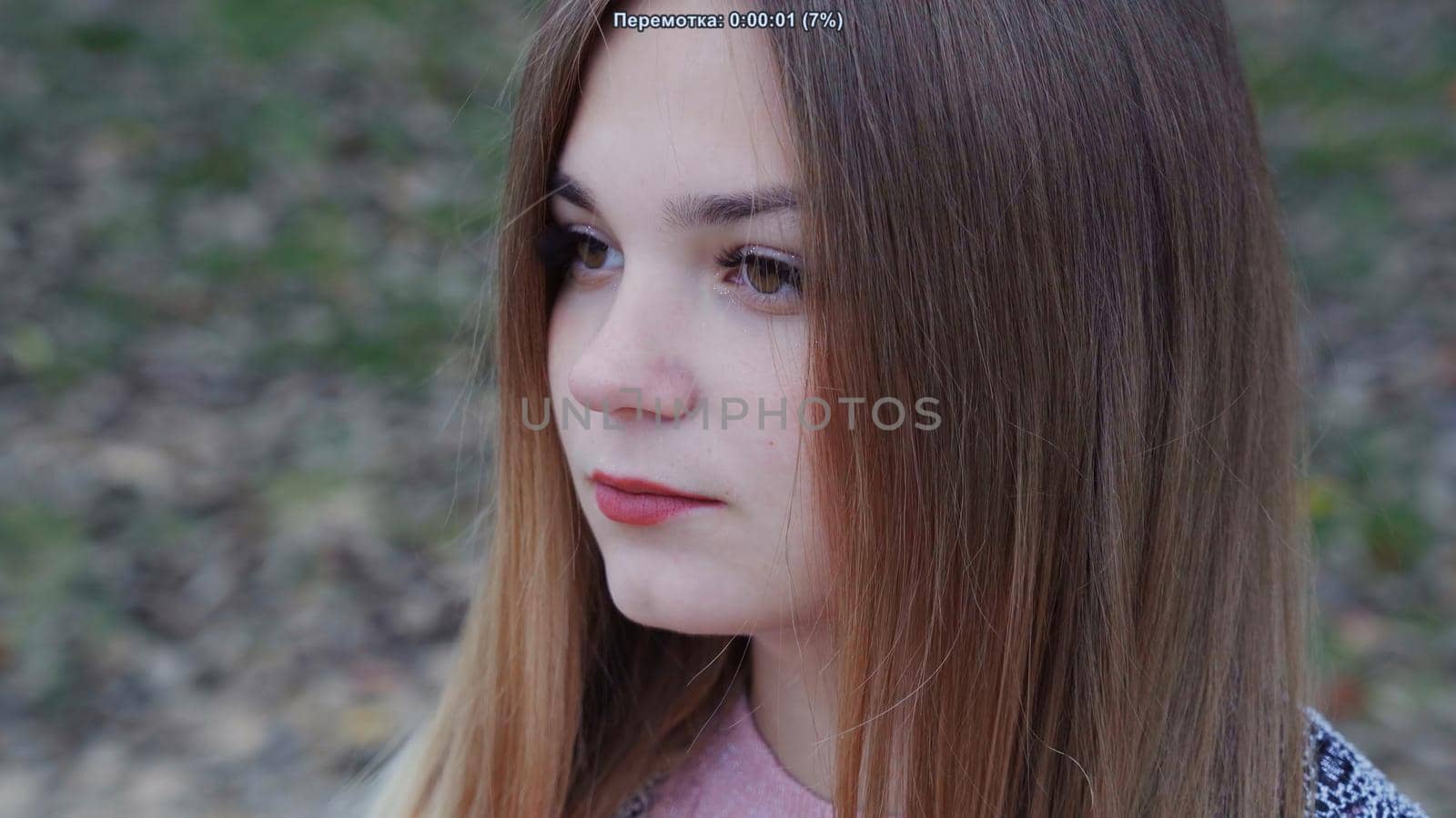 Beautiful girl posing in the autumn evening. Face close-up. by DovidPro