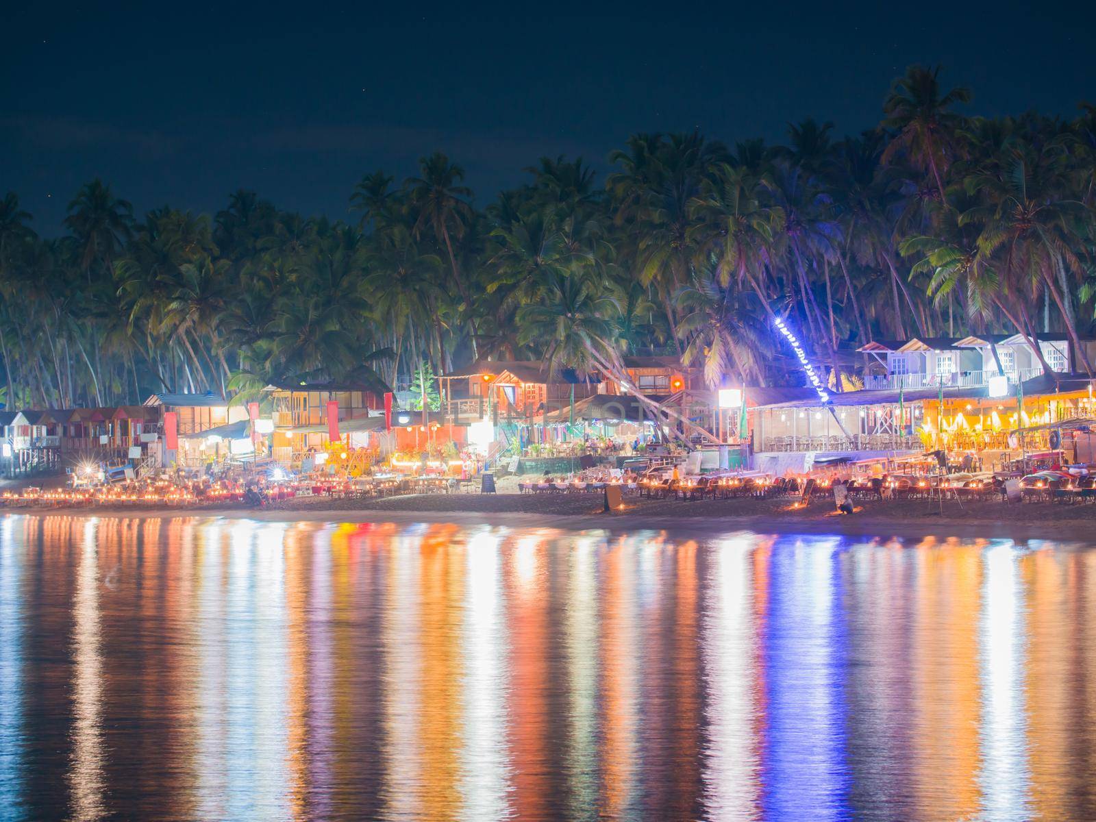 The lights of the nightly Palolem beach in Goa. India. by DovidPro