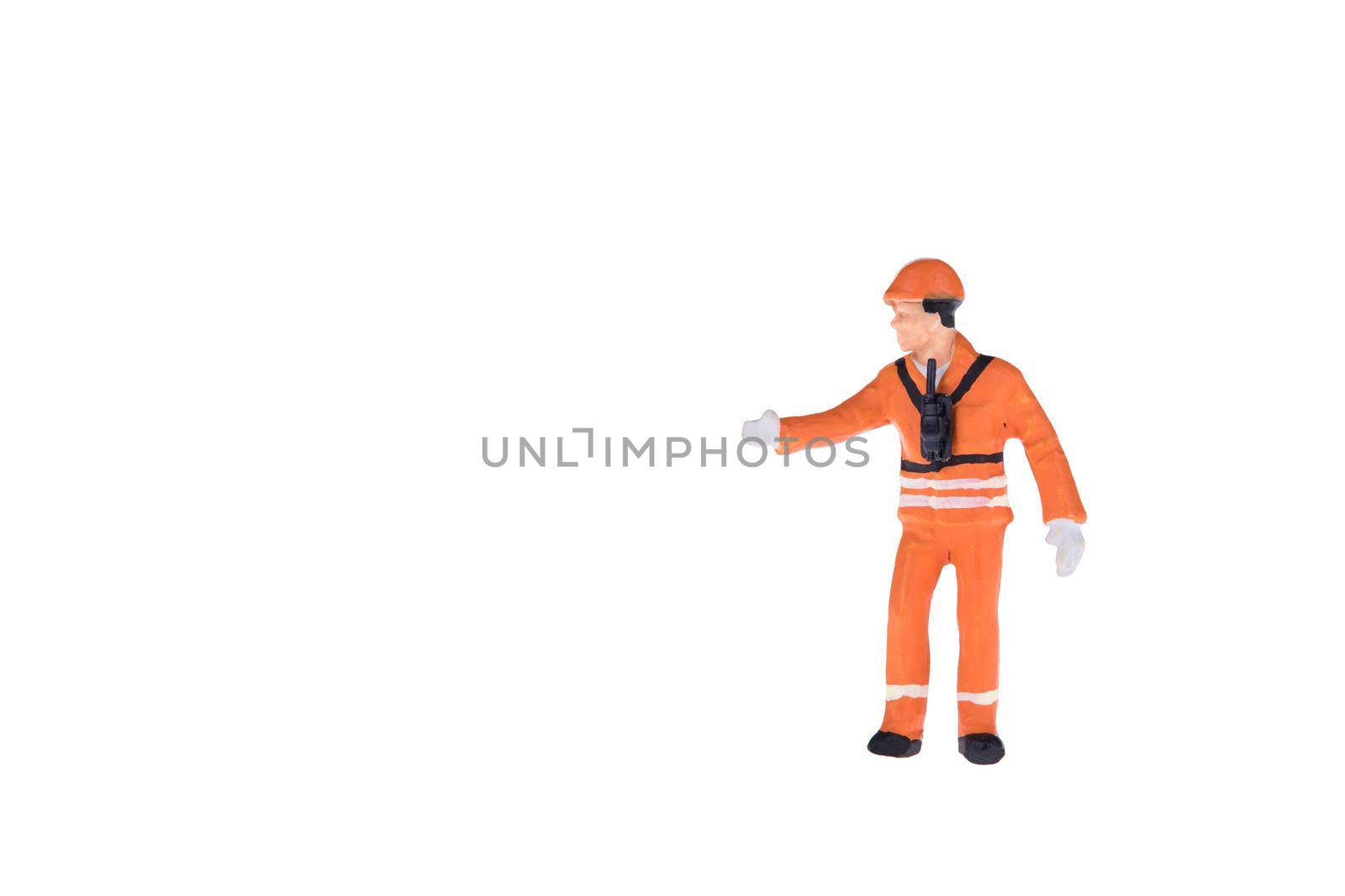 Close up of Miniature people in engineer and worker occupation isolate on white background. by Nuamfolio