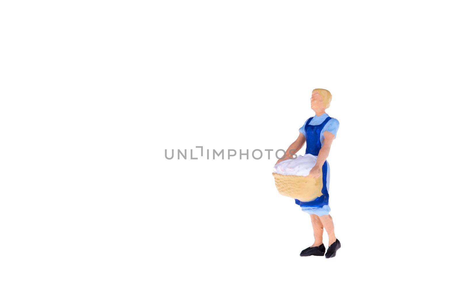 Close up of Miniature people isolate on white background. Elegant Design with copy space for placement your text, mock up for laundry and house keeping concept by Nuamfolio