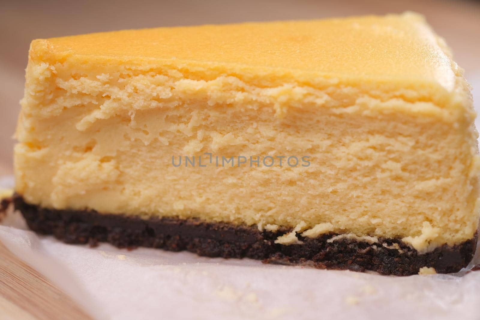 chocolate and cream cake on a plate on table .