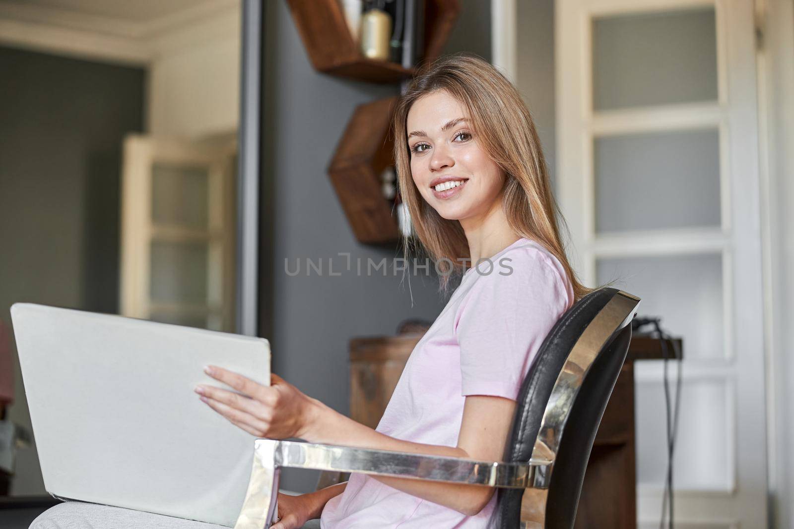 Happy beautiful light hair caucasian woman at beauty salon