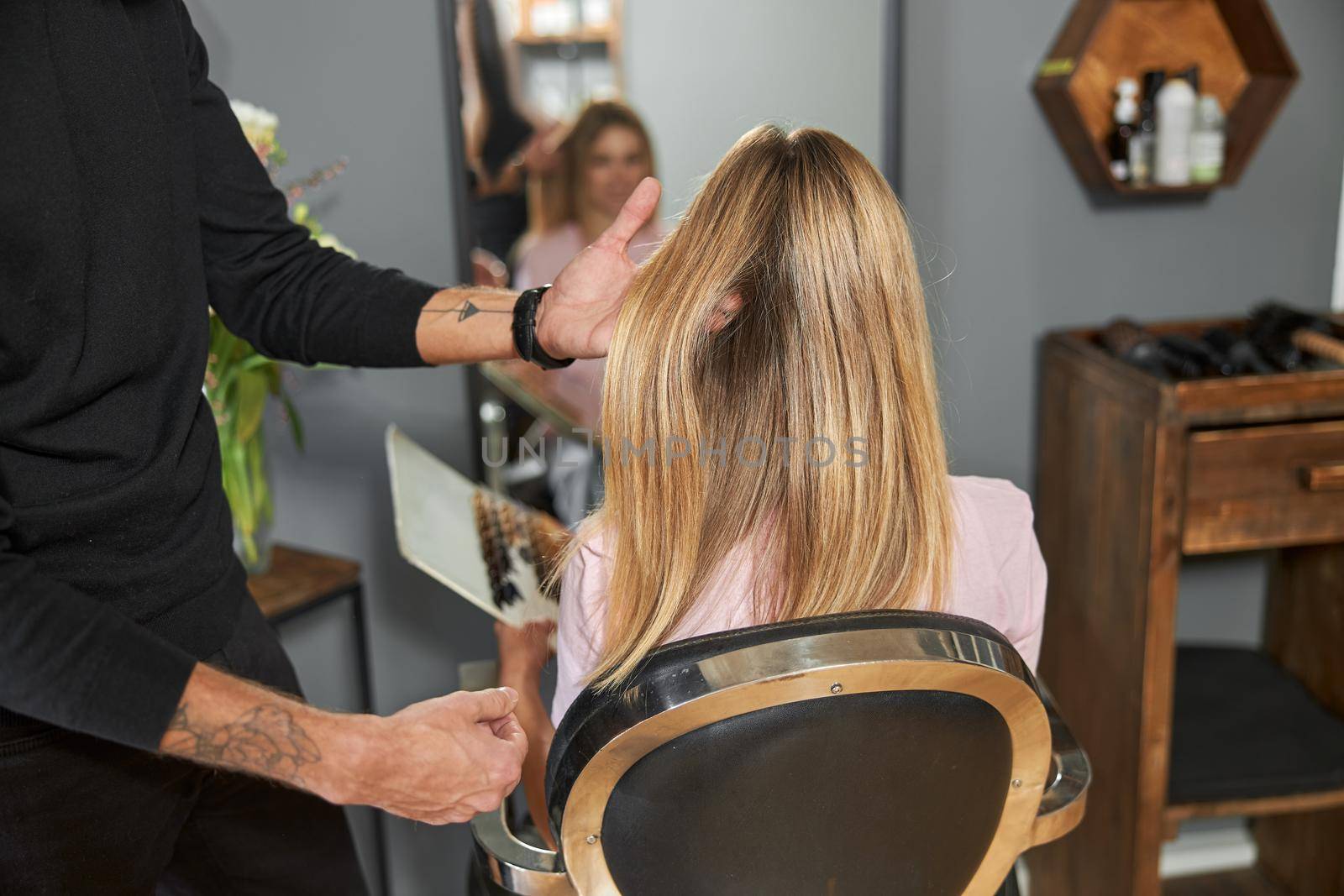 Happy beautiful light hair caucasian woman at beauty salon