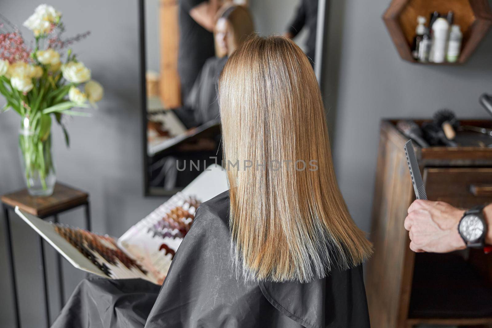 Happy beautiful light hair caucasian woman at beauty salon