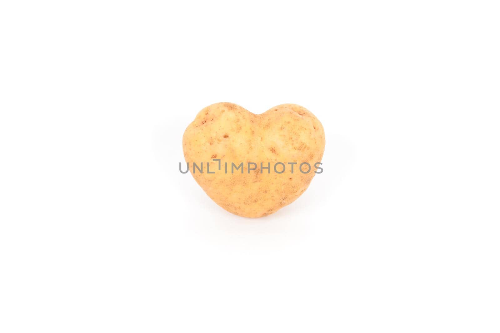 fresh potato tuber with the heart form