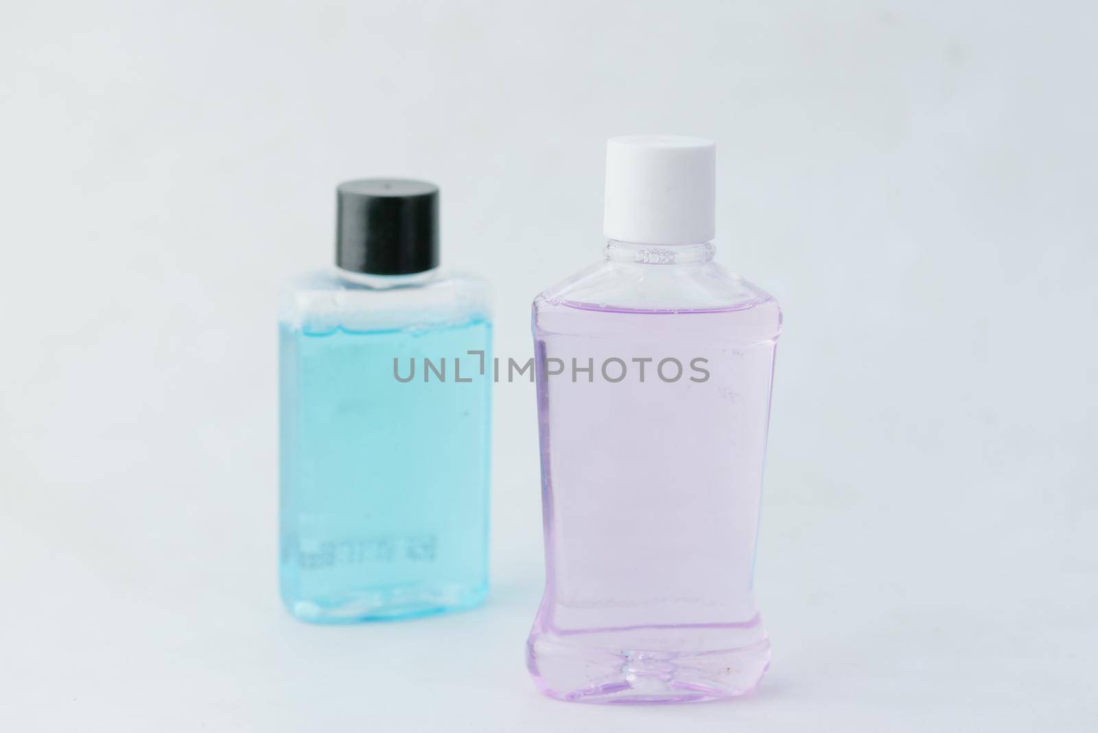 mouthwash liquid in a container on table ,