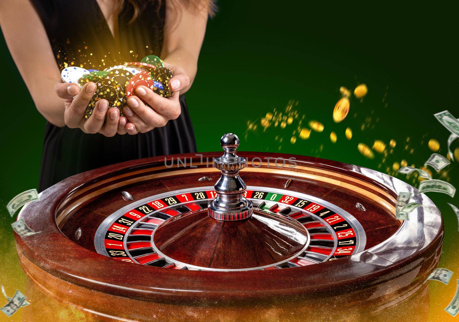 Collage of casino images with a close-up vibrant image of multicolored casino roulette table with poker chips in woman hands. Green background with golden sparks