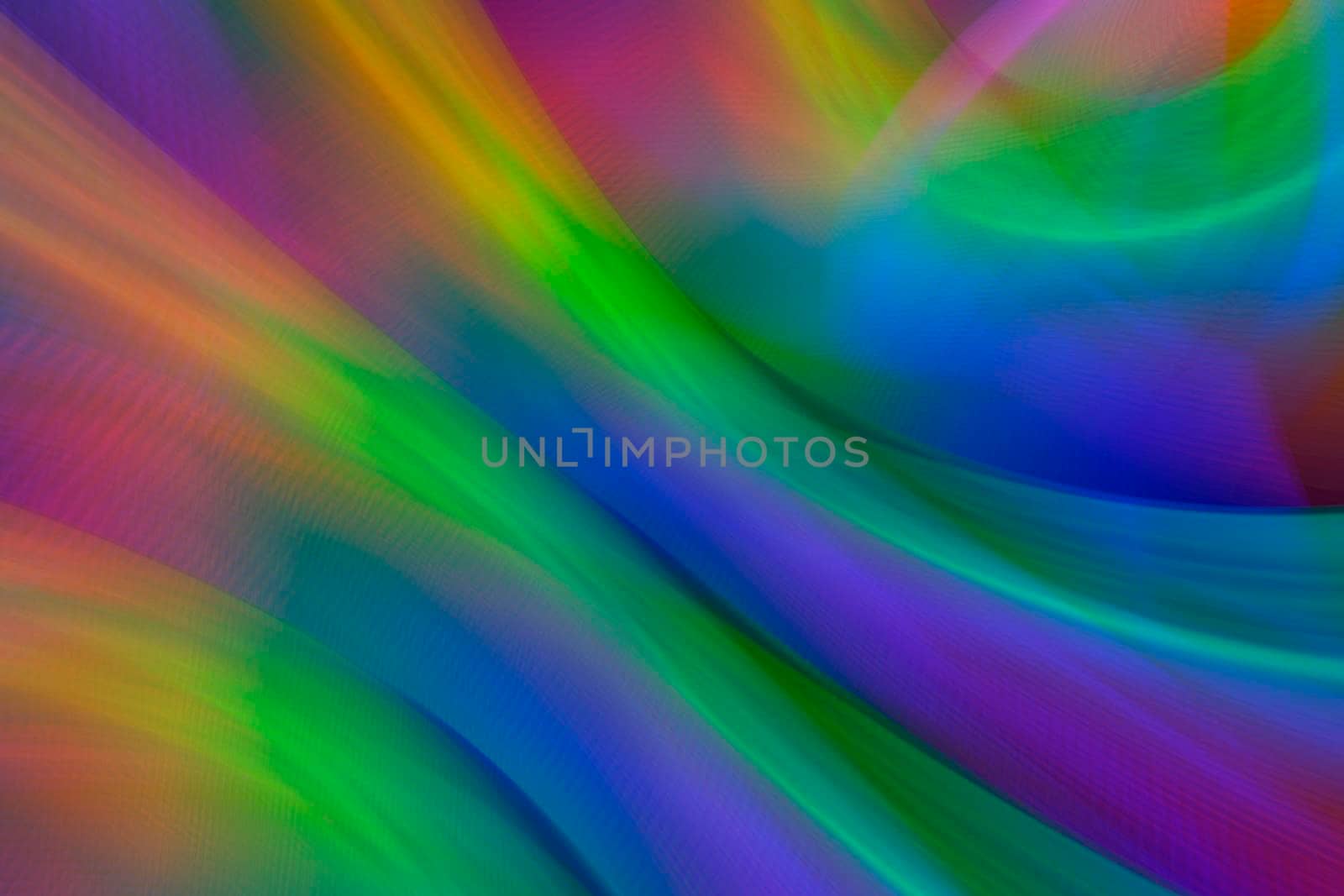 Abstract neon background with rainbow highlights of light.