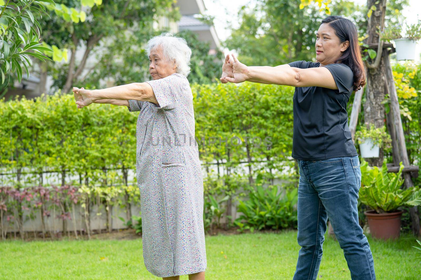 Asian senior or elderly old lady woman patient exercise with happy fresh enjoy in park, healthy strong medical concept by pamai